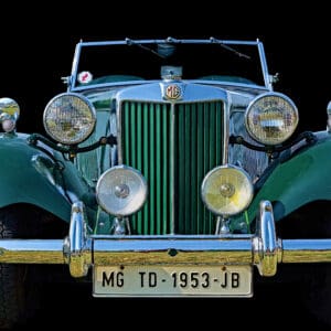 Classic green MG car front view.