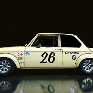 Vintage race car with number 26 decals.